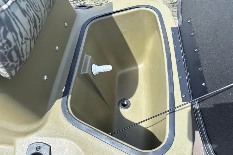 Slide: The Image of Livewell compartment in 2027 Tracker Grizzly 1860 CC boat, featuring durable construction. - 18