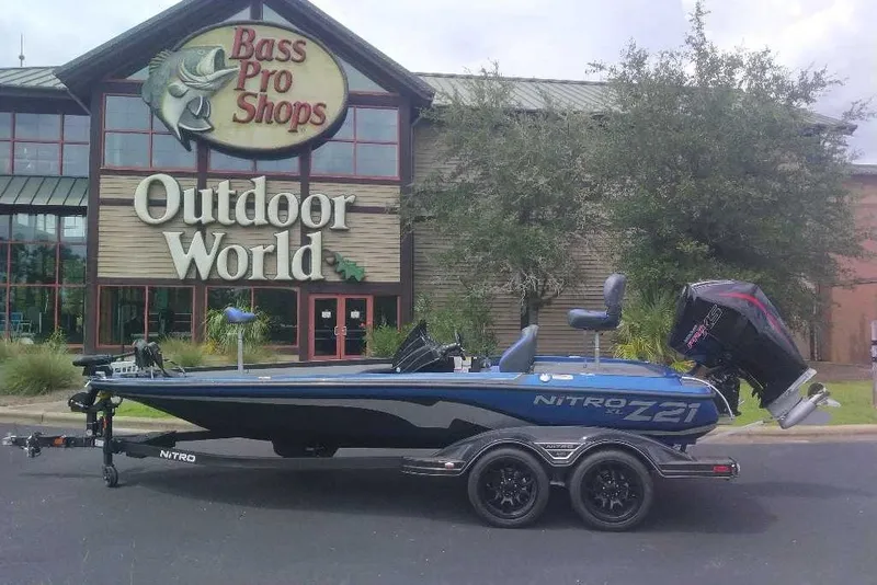 Slide: The Image of 2027 Nitro Z21 XL boat parked outside Bass Pro Shops Outdoor World. - 11