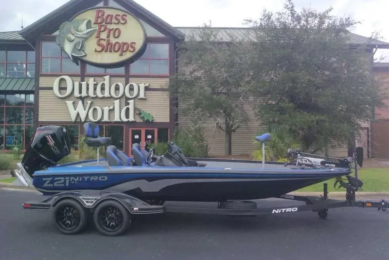 The Image of 2027 Nitro Z21 XL boat parked outside Bass Pro Shops Outdoor World. - 0