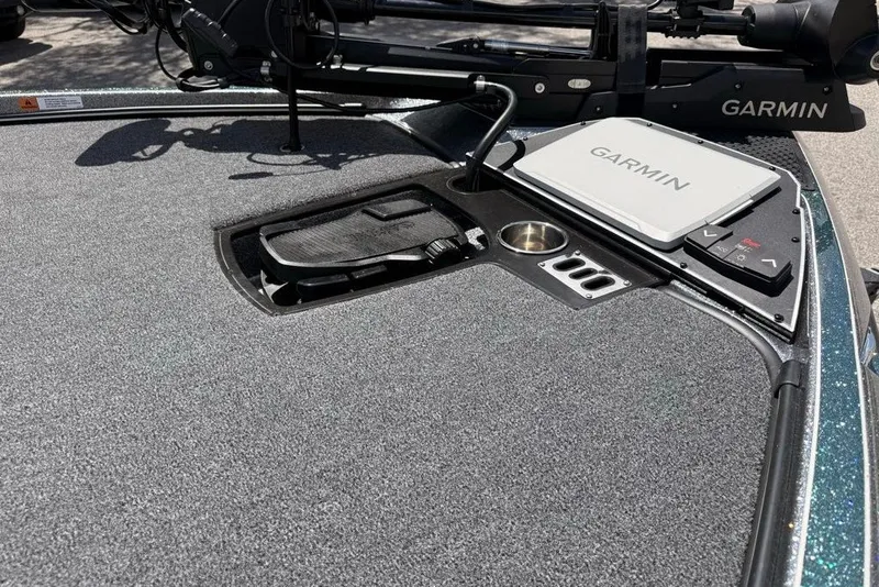 Slide: The Image of 2026 Ranger Z521R Cup-Equipped boat deck with Garmin electronics and pedal controls. - 94