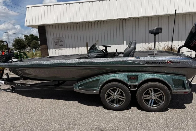The Image of 2026 Ranger Z521R Cup-Equipped boat on trailer, parked outdoors. - 0