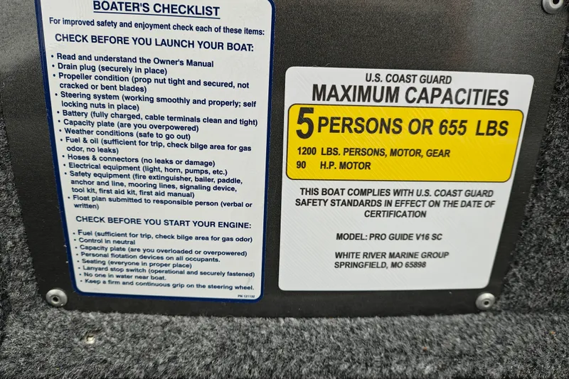 Slide: The Image of Boater's checklist and capacity label on 2027 Tracker Pro Guide V-16 SC boat. - 19