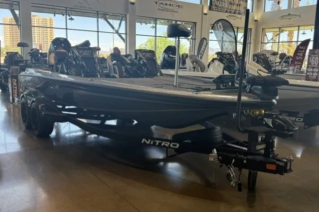 The Image of 2027 Nitro Z20 XL Pro boat displayed in a showroom, showcasing sleek design and advanced features. - 0