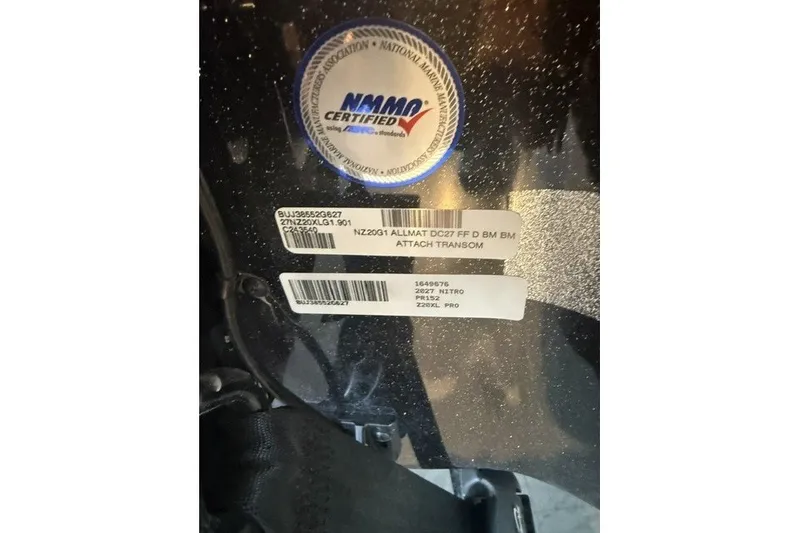 Slide: The Image of NMAO certified label on 2027 Nitro Z20 XL Pro boat transom. - 13