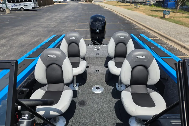 Slide: The Image of 2027 Tracker Targa V-18 Combo boat interior with four cushioned seats. - 17