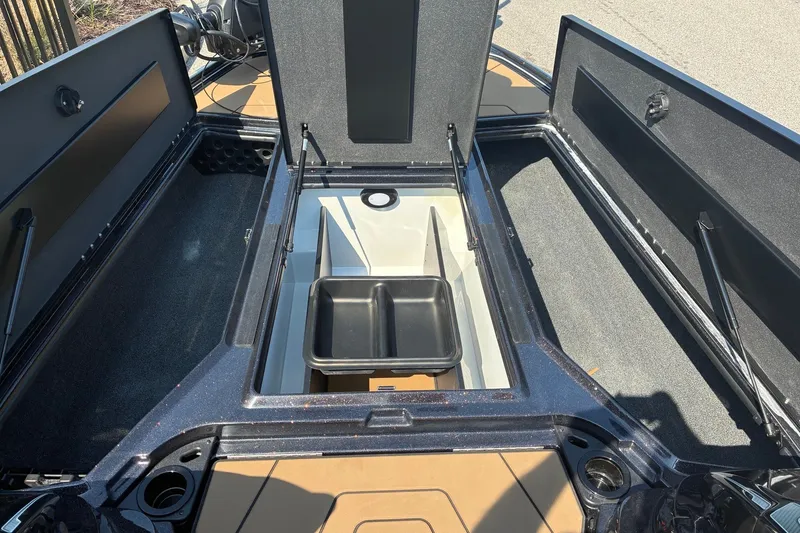 Slide: The Image of Open storage compartments on a 2027 Nitro Z20 XL Pro boat. - 14
