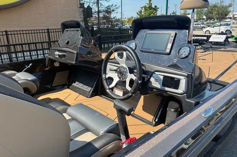 Slide: The Image of 2027 Nitro Z20 XL Pro boat interior with steering wheel and dashboard controls. - 4