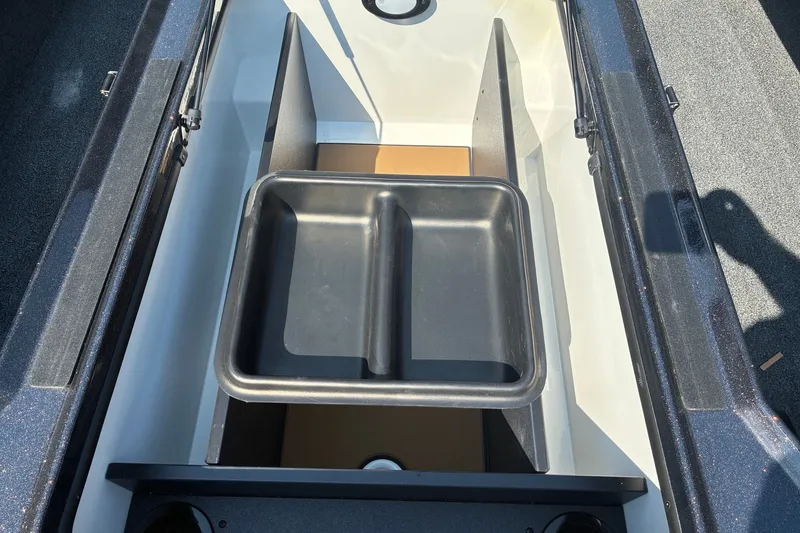 Slide: The Image of Storage compartment of 2027 Nitro Z20 XL Pro boat with removable tray. - 15