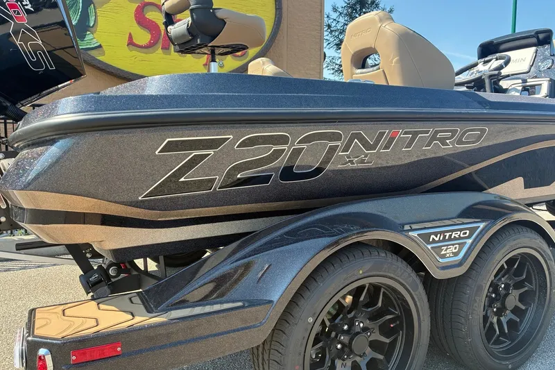 Slide: The Image of 2027 Nitro Z20 XL Pro boat with sleek design and dual wheels. - 1