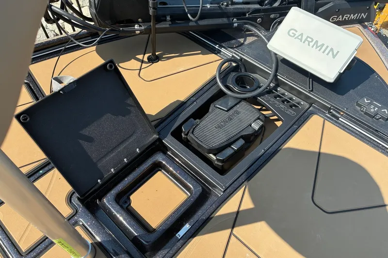 Slide: The Image of 2027 Nitro Z20 XL Pro boat deck with Garmin navigation system and pedal controls. - 13