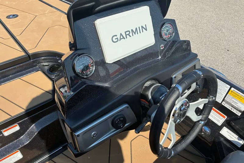 Slide: The Image of Dashboard of 2027 Nitro Z20 XL Pro boat with Garmin display and steering wheel. - 9