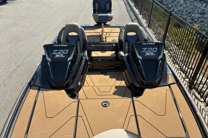 Slide: The Image of 2027 Nitro Z20 XL Pro boat with dual seats and sleek design on a sunny day. - 12