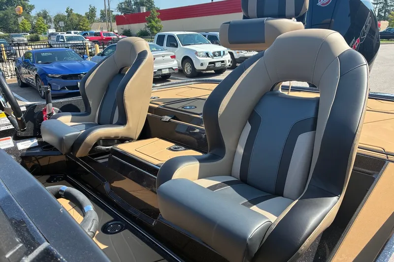 Slide: The Image of 2027 Nitro Z20 XL Pro boat seats in a parking lot, showcasing sleek design and comfort. - 7