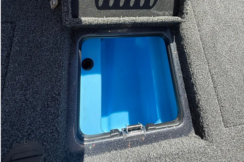 Slide: The Image of Open storage compartment in 2027 Nitro Z20 XL Pro boat. - 35