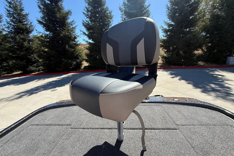 Slide: The Image of Boat seat on a 2027 Nitro Z20 XL Pro, surrounded by trees and pavement. - 39
