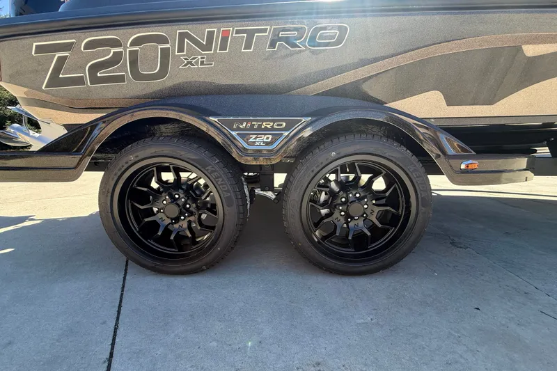 Slide: The Image of 2027 Nitro Z20 XL Pro boat trailer with black alloy wheels. - 47