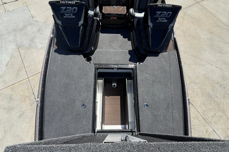 Slide: The Image of 2027 Nitro Z20 XL Pro boat interior with open storage compartment. - 33