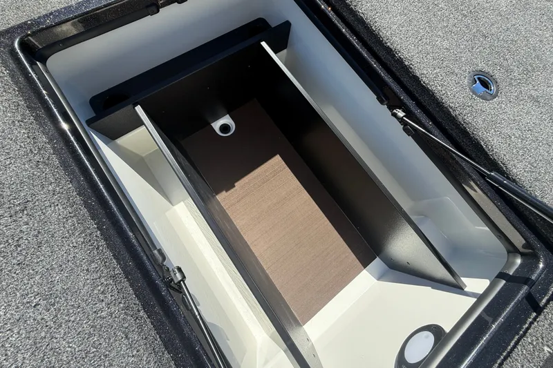 Slide: The Image of Storage compartment of 2027 Nitro Z20 XL Pro boat, featuring organized interior layout. - 30