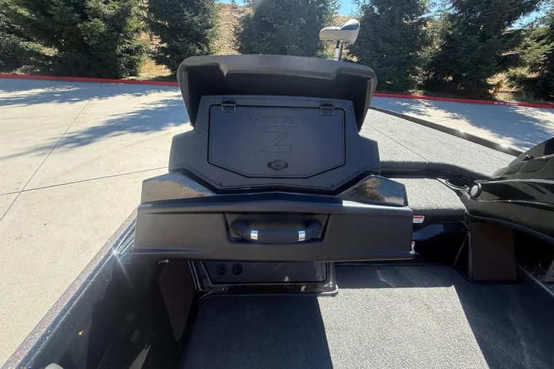 Slide: The Image of 2027 Nitro Z20 XL Pro boat storage compartment open, showcasing interior space. - 19