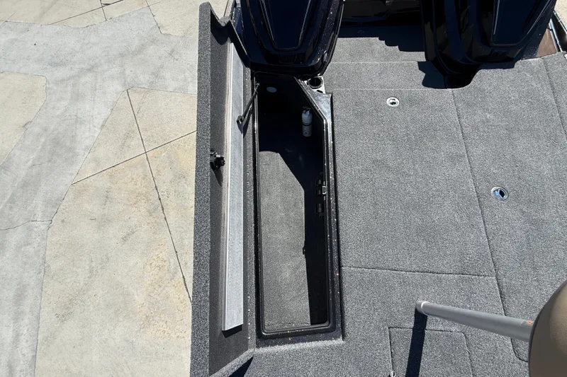 Slide: The Image of 2027 Nitro Z20 XL Pro boat deck with open storage compartment. - 31