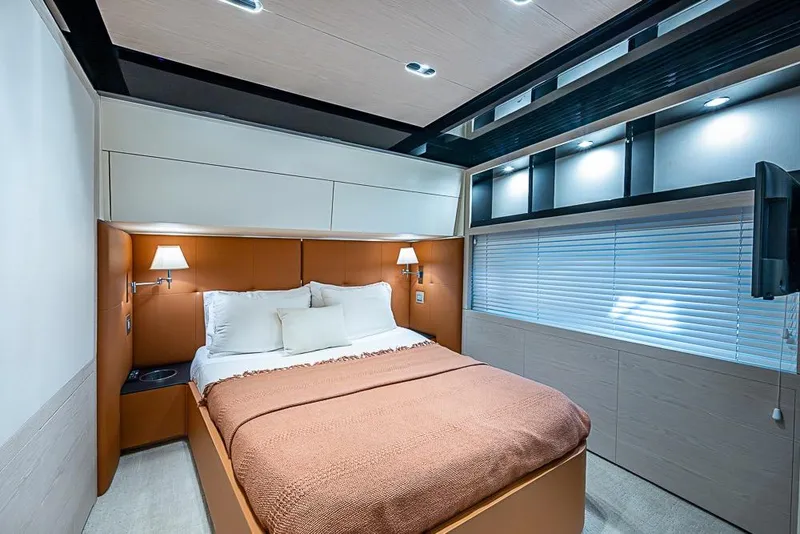 Slide: The Image of Luxurious bedroom interior of 2017 Azimut 80 yacht with modern design and cozy lighting. - 81