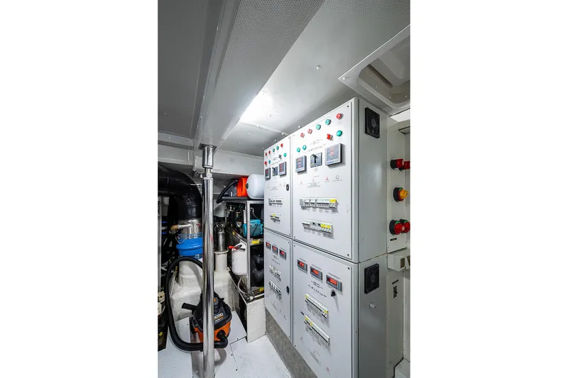 Slide: The Image of Electrical control room of 2017 Azimut 80 yacht, featuring panels and equipment. - 98
