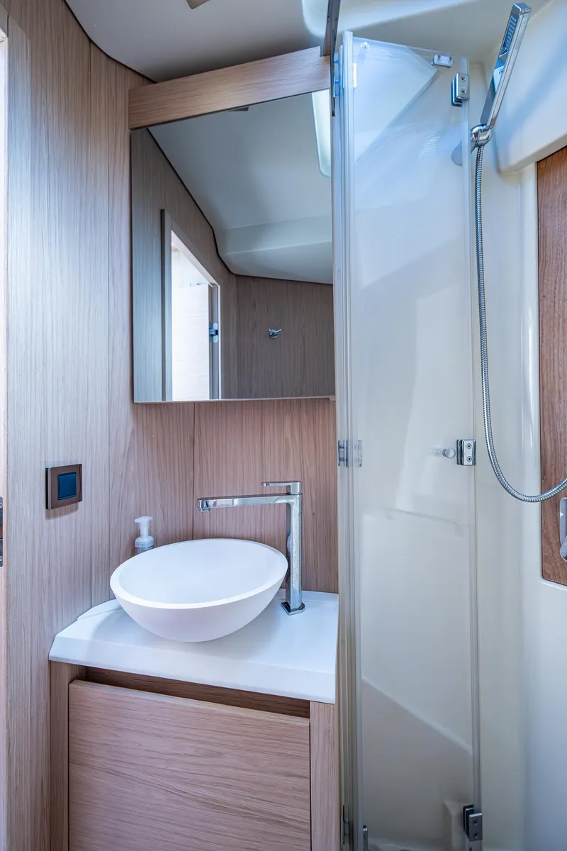 Slide: The Image of 2015 Beneteau Monte Carlo bathroom with modern sink and shower. - 33
