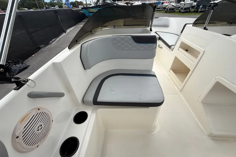 Slide: The Image of 2024 Bayliner Element M17 boat interior with seating and storage compartments. - 22