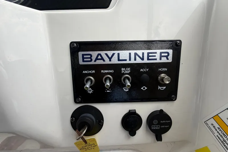 Slide: The Image of Control panel of 2024 Bayliner Element M17 boat with switches and inputs. - 20