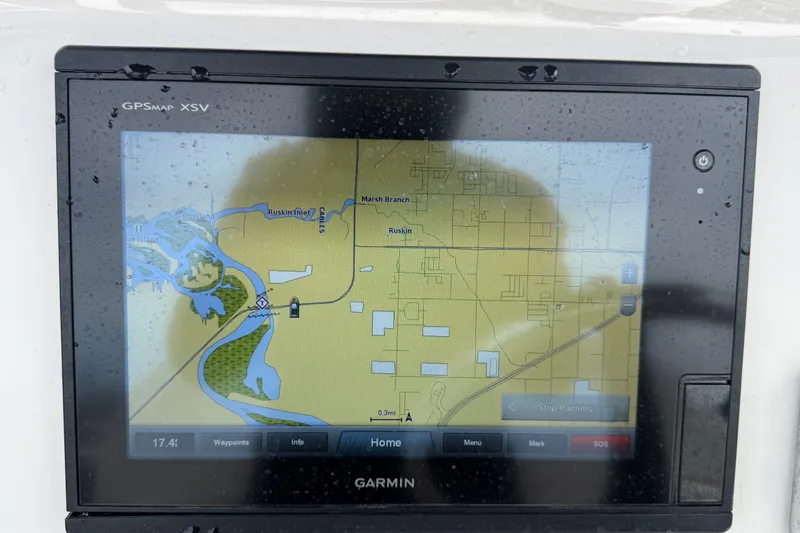 Slide: The Image of Garmin GPS display on 2019 Robalo 226 Cayman boat, showing navigation map. - 23