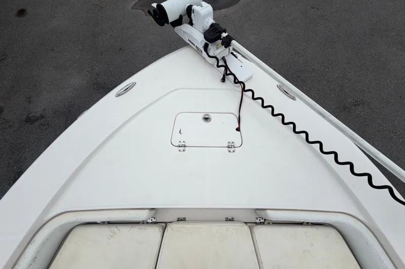 Slide: The Image of Bow view of 2019 Robalo 226 Cayman boat with trolling motor attached. - 44