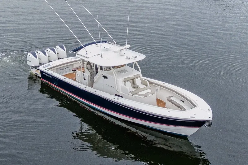 Slide: The Image of 2018 Regulator 41 boat with four engines on calm water. - 4