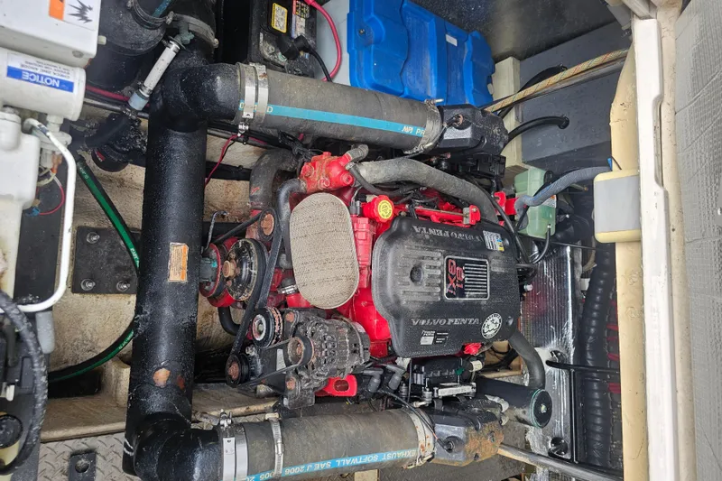 Slide: The Image of Engine compartment of a 2007 Regal Commodore 4460 boat, featuring a Volvo Penta engine. - 18
