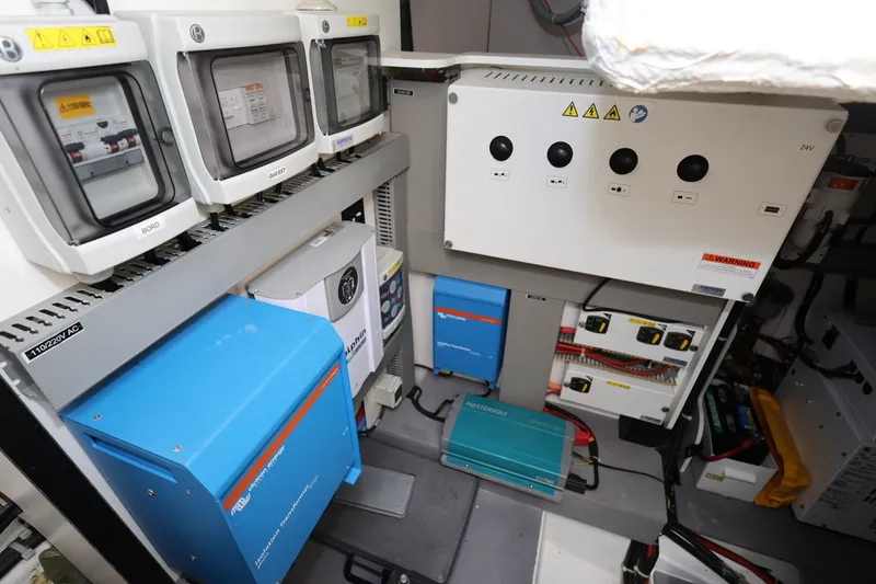 Slide: The Image of Electrical control panel in a 2019 Beneteau Gran Turismo 50 yacht engine room. - 39