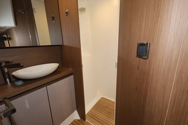 Slide: The Image of Luxurious bathroom interior of 2019 Beneteau Gran Turismo 50 yacht with modern fixtures. - 34