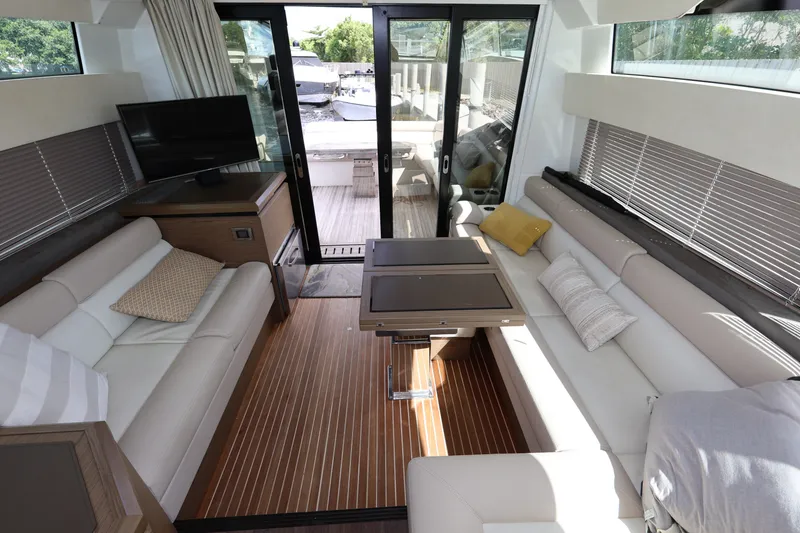 Slide: The Image of Luxurious interior of 2019 Beneteau Gran Turismo 50 yacht with elegant seating and modern decor. - 37