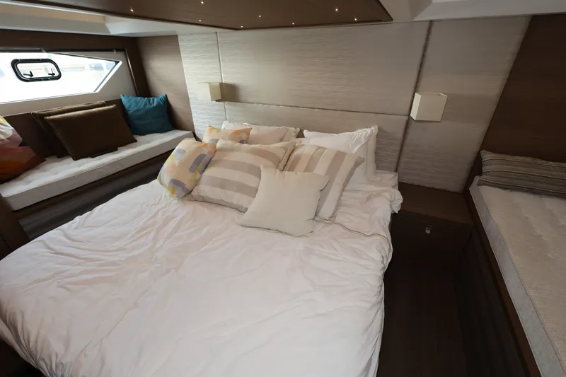 Slide: The Image of Luxurious cabin interior of 2019 Beneteau Gran Turismo 50 yacht with cozy bedding. - 33