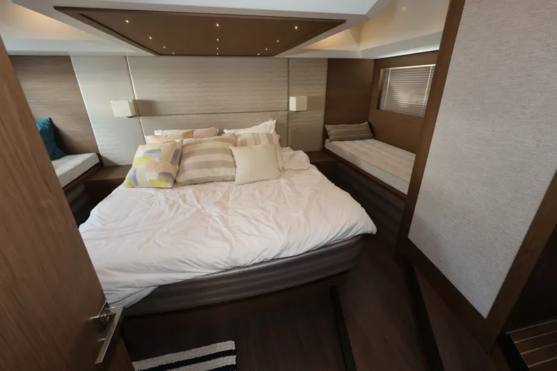 Slide: The Image of Luxurious bedroom interior of 2019 Beneteau Gran Turismo 50 yacht with modern design. - 32