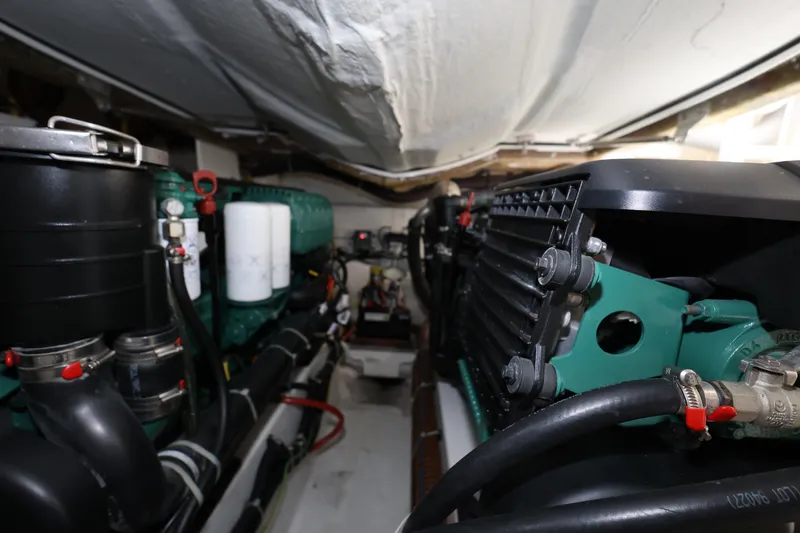 Slide: The Image of Engine room of 2019 Beneteau Gran Turismo 50 yacht, showcasing mechanical components. - 41