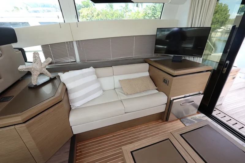 Slide: The Image of Luxurious interior of 2019 Beneteau Gran Turismo 50 yacht with cozy seating and modern decor. - 18