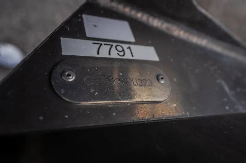 Slide: The Image of 2023 Crest Caribbean LX 250 identification plate with serial number 7791. - 42