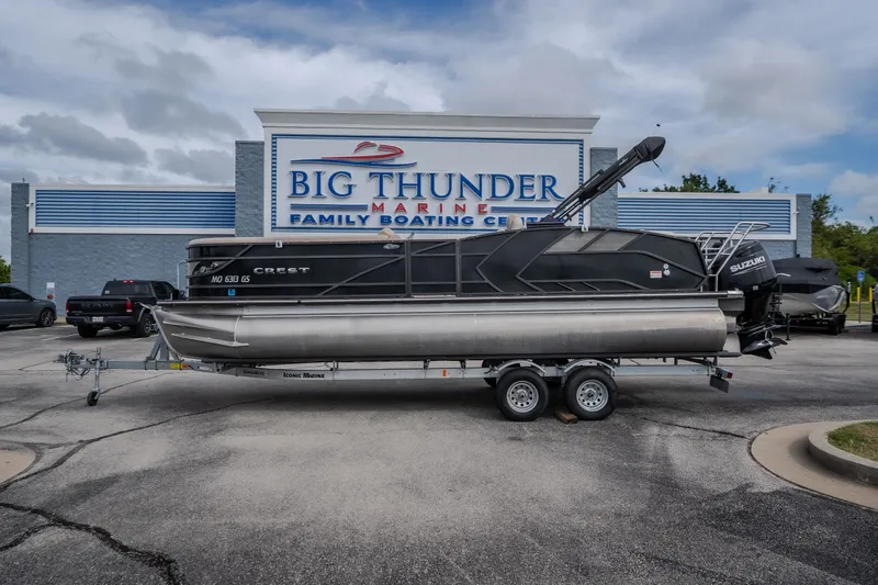 Slide: The Image of 2023 Crest Caribbean LX 250 pontoon boat at Big Thunder Marine dealership. - 27
