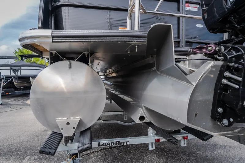Slide: The Image of 2023 Crest Caribbean LX 250 pontoon boat on LoadRite trailer, rear view. - 25