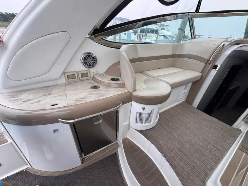 Slide: The Image of The image shows the cockpit of a 2016 Formula 40 Performance Cruiser with sleek seating and a small fridge. - 8