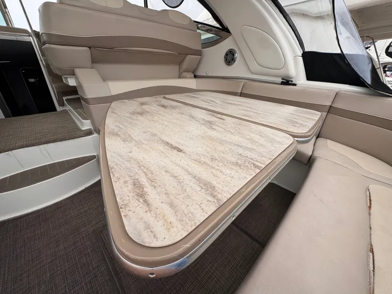 Slide: The Image of Interior of a 2016 Formula 40 Performance Cruiser with elegant seating area and table. - 6