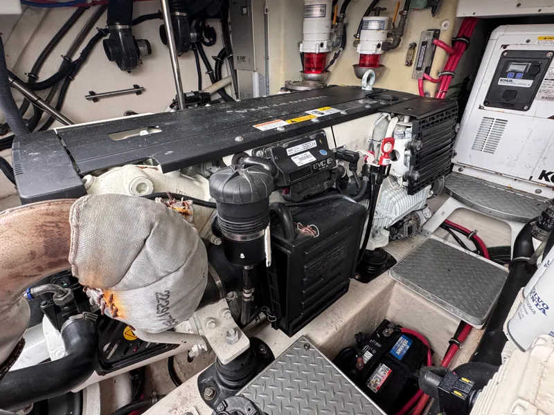 Slide: The Image of Engine room of a 2016 Formula 40 Performance Cruiser with complex wiring and machinery. - 30