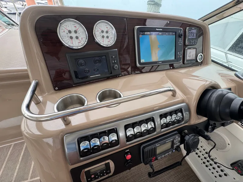 Slide: The Image of The dashboard of a 2016 Formula 40 Performance Cruiser with modern instruments and navigation system. - 13