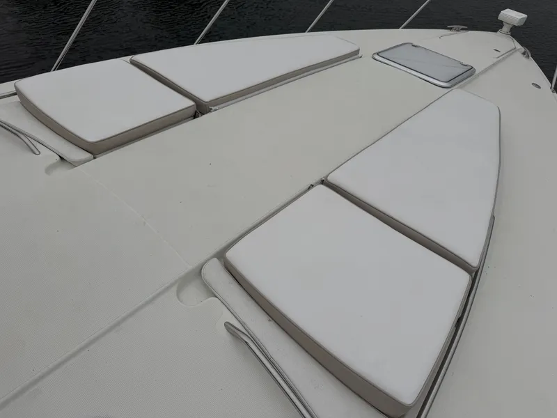 Slide: The Image of The image shows the deck of a 2016 Formula 40 Performance Cruiser with white sun loungers. - 17