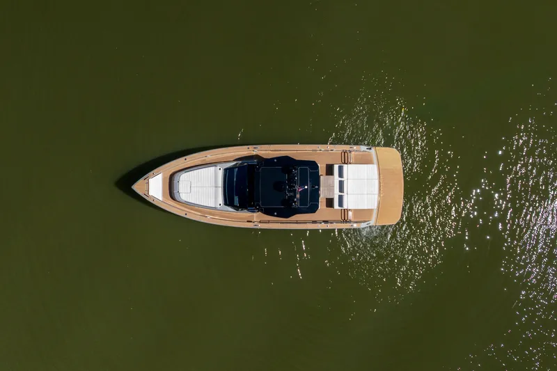 Slide: The Image of Aerial view of 2023 Pardo Yachts 43 on calm green water. - 75