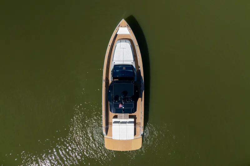 Slide: The Image of Overhead view of 2023 Pardo Yachts 43 cruising on calm water. - 76